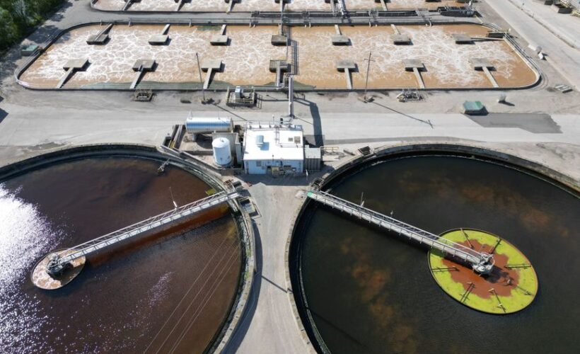 Aerial shot of an industrial water treatment plant with large circular tanks. - Photo by Giant Asparagus on Pexels