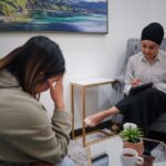 A therapist and client during a counseling session, focusing on mental health support. - Photo by World Sikh Organization of Canada on Pexels